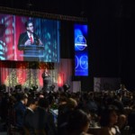 Stage view from Fresno State Top Dog Gala with lighting design and audio visual consulting